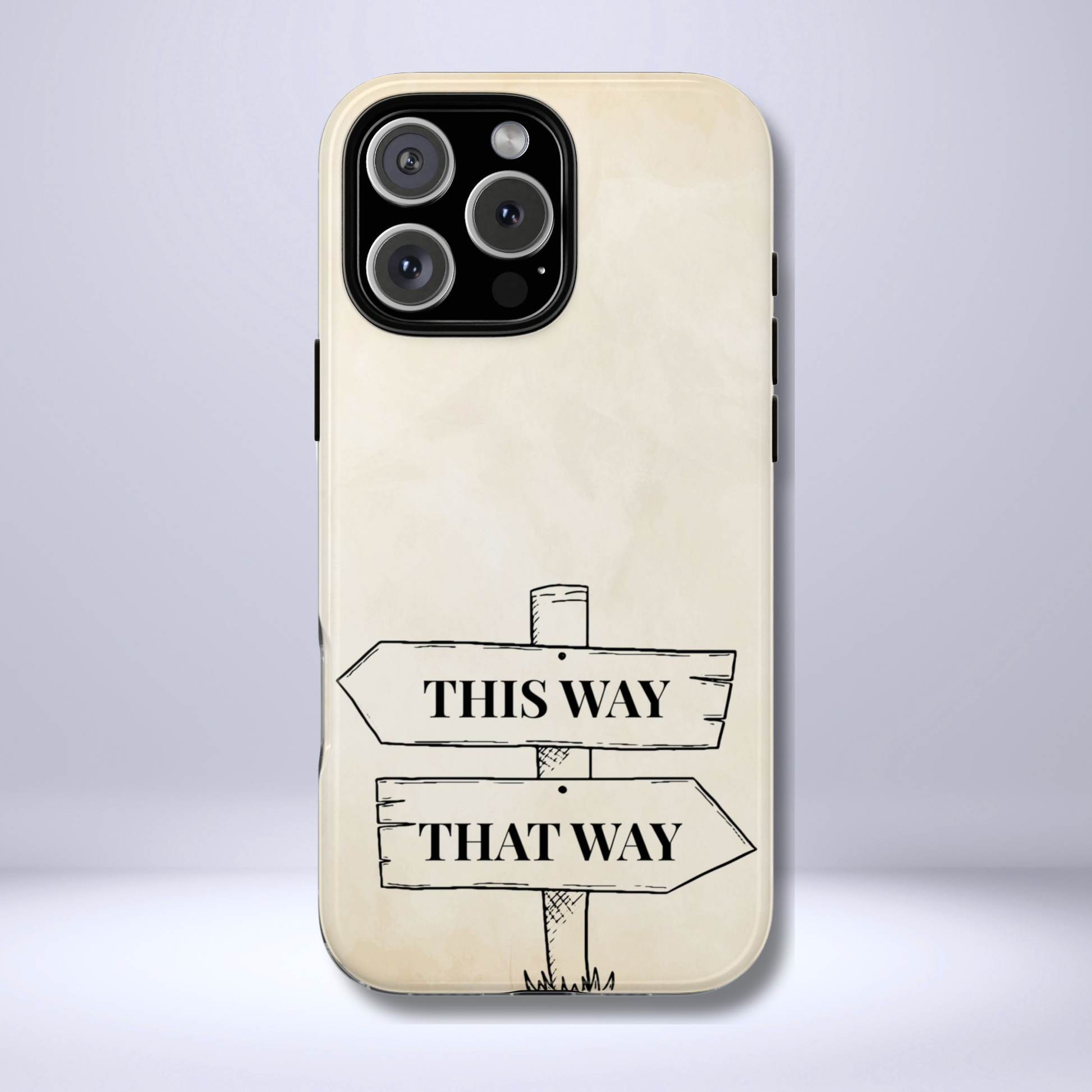 Alice in Wonderland tough phone case featuring the whimsical “This Way” and “That Way” signpost from the classic story. This dual-layer design protects iPhone 16, iPhone 17, Galaxy, and Google Pixel phones while keeping a vintage book-inspired aesthetic.
